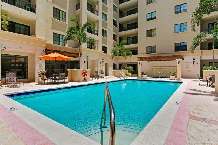 233 South Federal Highway, Unit 301 Boca Raton, FL 33432 - Photo 30 of 30 a view of a building with a swimming pool