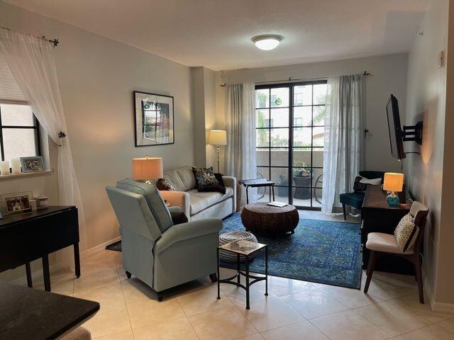 233 South Federal Highway, Unit 301 Boca Raton, FL 33432 - Photo 3 of 30 a living room with furniture and a window