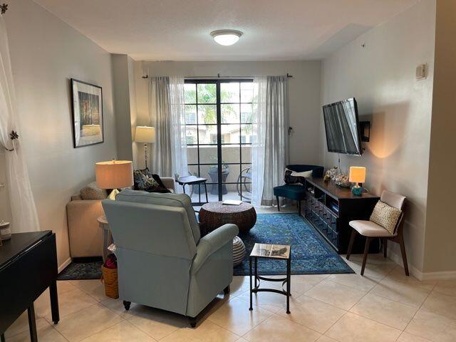 233 South Federal Highway, Unit 301 Boca Raton, FL 33432 - Photo 5 of 30 a living room with furniture and a window