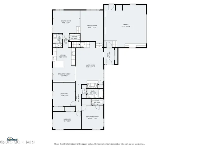 a view of a house with a yard and garage