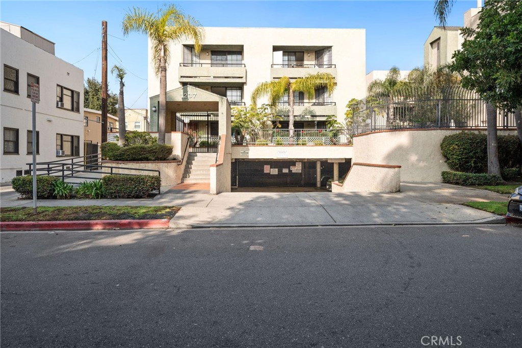 1237 East 6th Street, Unit 201 Long Beach, CA 90802 - Photo 1 of 27 a view of a street with a building in the background