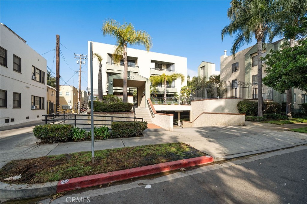1237 East 6th Street, Unit 201 Long Beach, CA 90802 - Photo 20 of 27 a view of a building with many windows