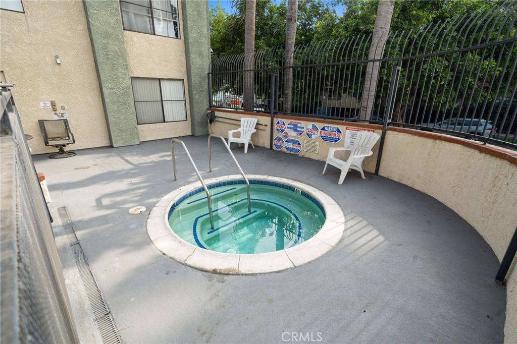 1237 East 6th Street, Unit 201 Long Beach, CA 90802 - Photo 23 of 27 a view of a chairs in a patio