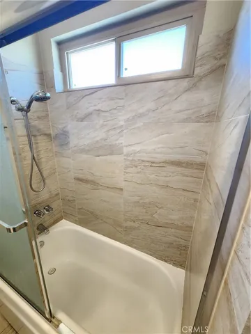 a bathroom with a bathtub
