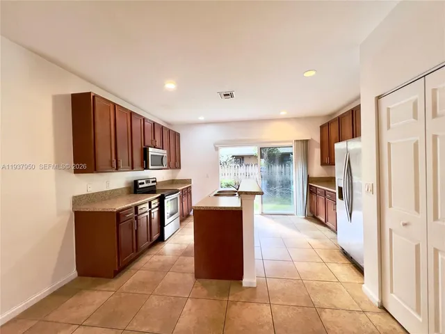 $365,000 | 5906 Woodlands Boulevard, Tamarac, FL 33319