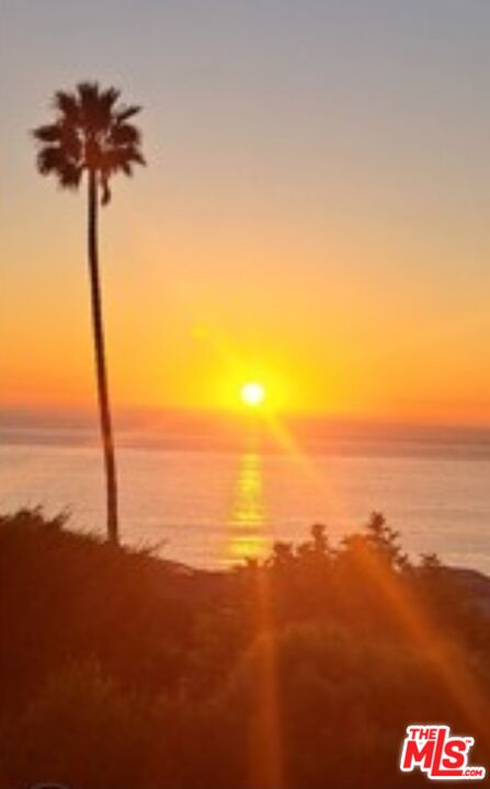 1710 Decker Road Malibu, CA 90265 - Photo 21 of 23 a view of an ocean and a mountain