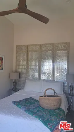 a room with a rug and a window