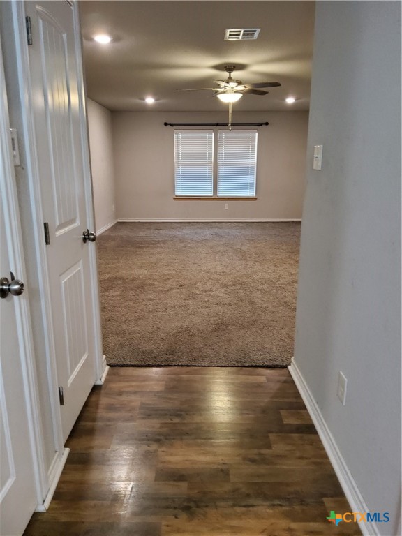 1601 County Road 153 Evant, TX 76525 - Photo 16 of 25 wooden floor in an empty room with wooden floor