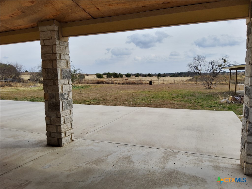 1601 County Road 153 Evant, TX 76525 - Photo 8 of 25 a view of a lake with a big yard