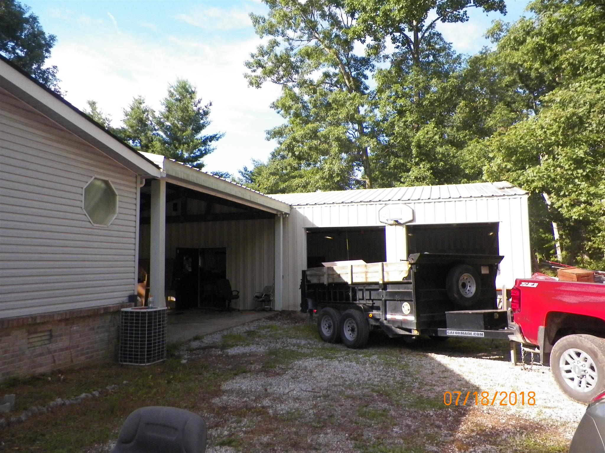 267 Running Meadows Road Portland, TN 37148 - Photo 14 of 25 a view of a car parked in back of house