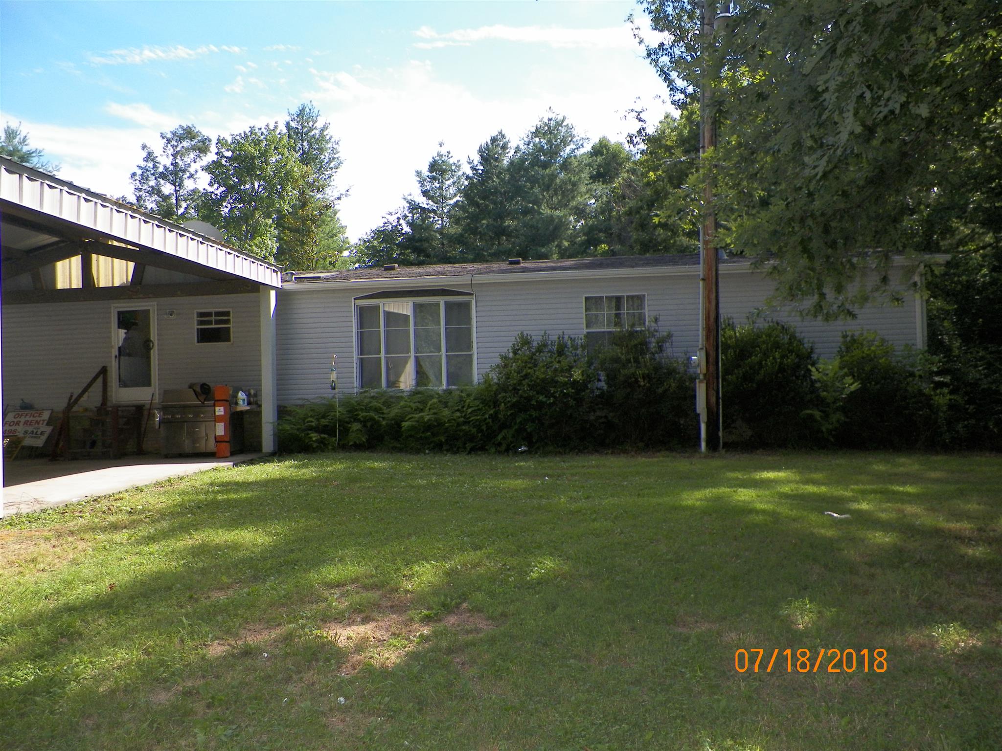 267 Running Meadows Road Portland, TN 37148 - Photo 15 of 25 a view of a backyard of the house