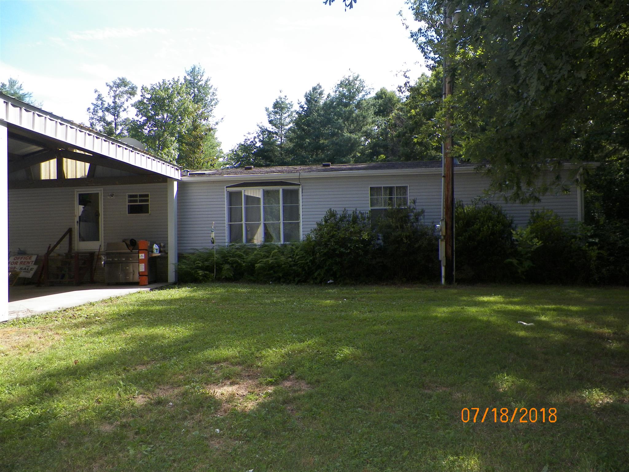 267 Running Meadows Road Portland, TN 37148 - Photo 21 of 25 a view of a backyard of the house