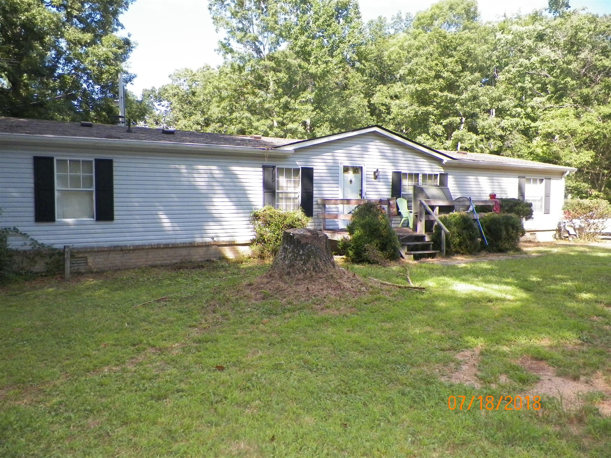 267 Running Meadows Road Portland, TN 37148 - Photo 5 of 25 a view of a house with a yard
