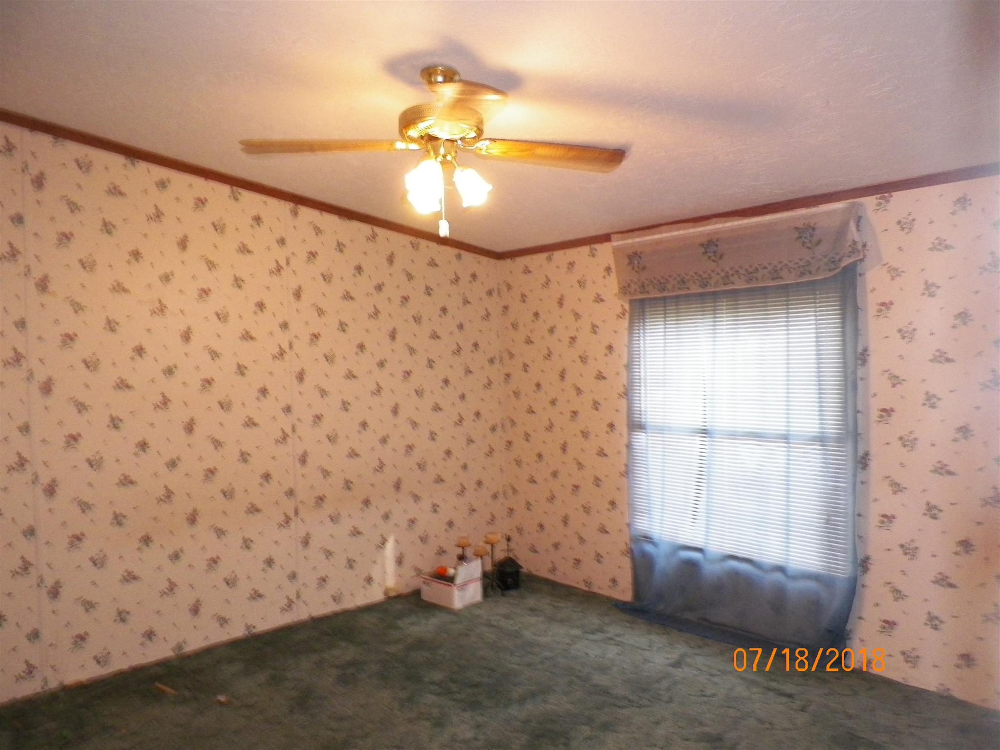 267 Running Meadows Road Portland, TN 37148 - Photo 8 of 25 view of room with a ceiling fan and window