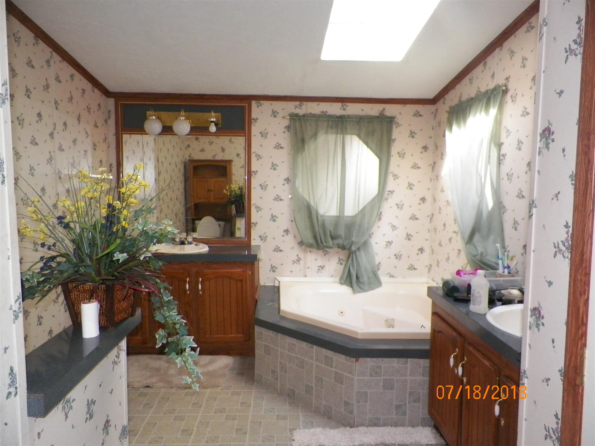 267 Running Meadows Road Portland, TN 37148 - Photo 9 of 25 a living room with furniture and a mirror