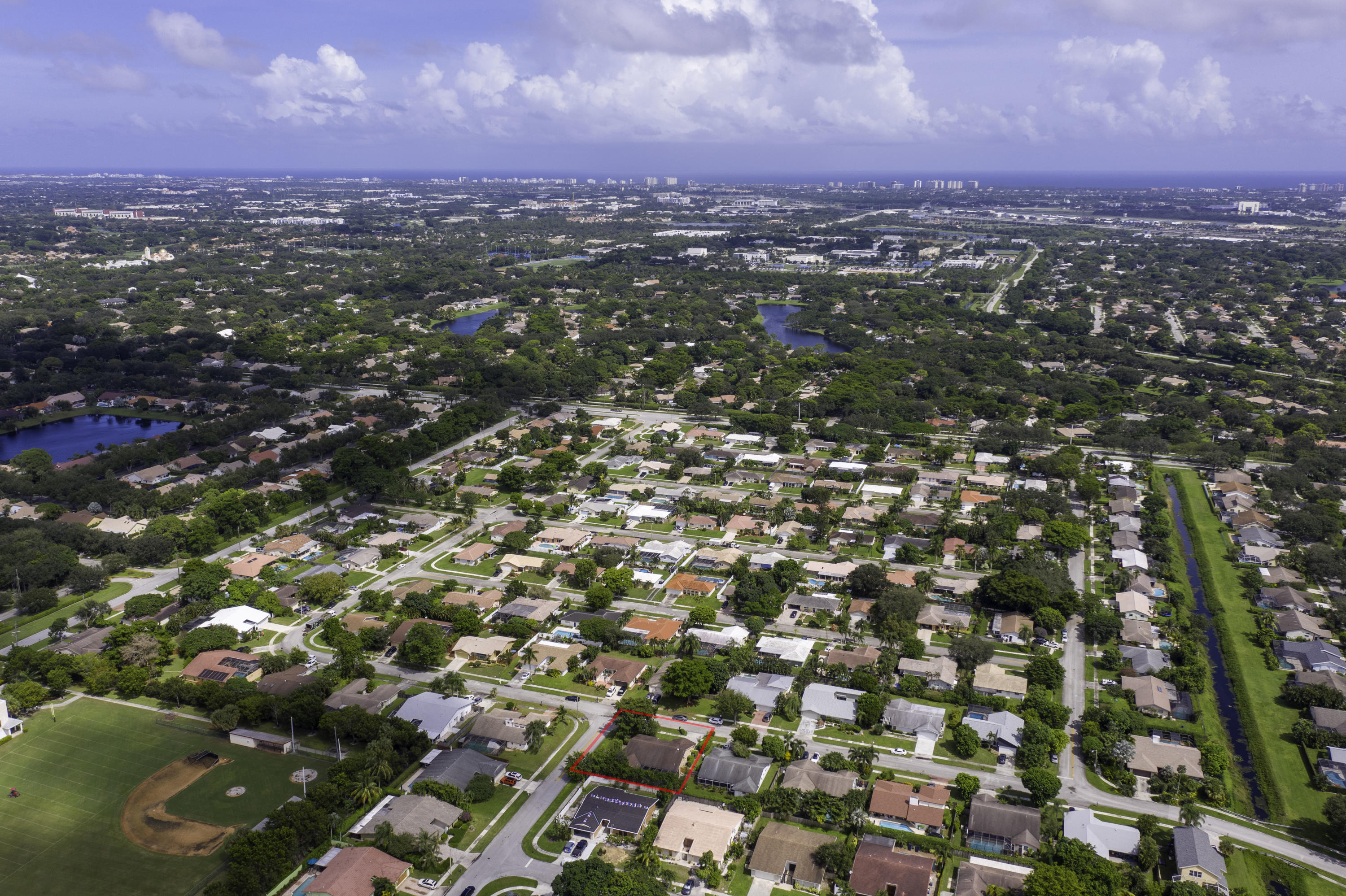 3375 Northwest 27th Avenue Boca Raton, FL 33434 - Photo 2 of 27 an aerial view of multiple house
