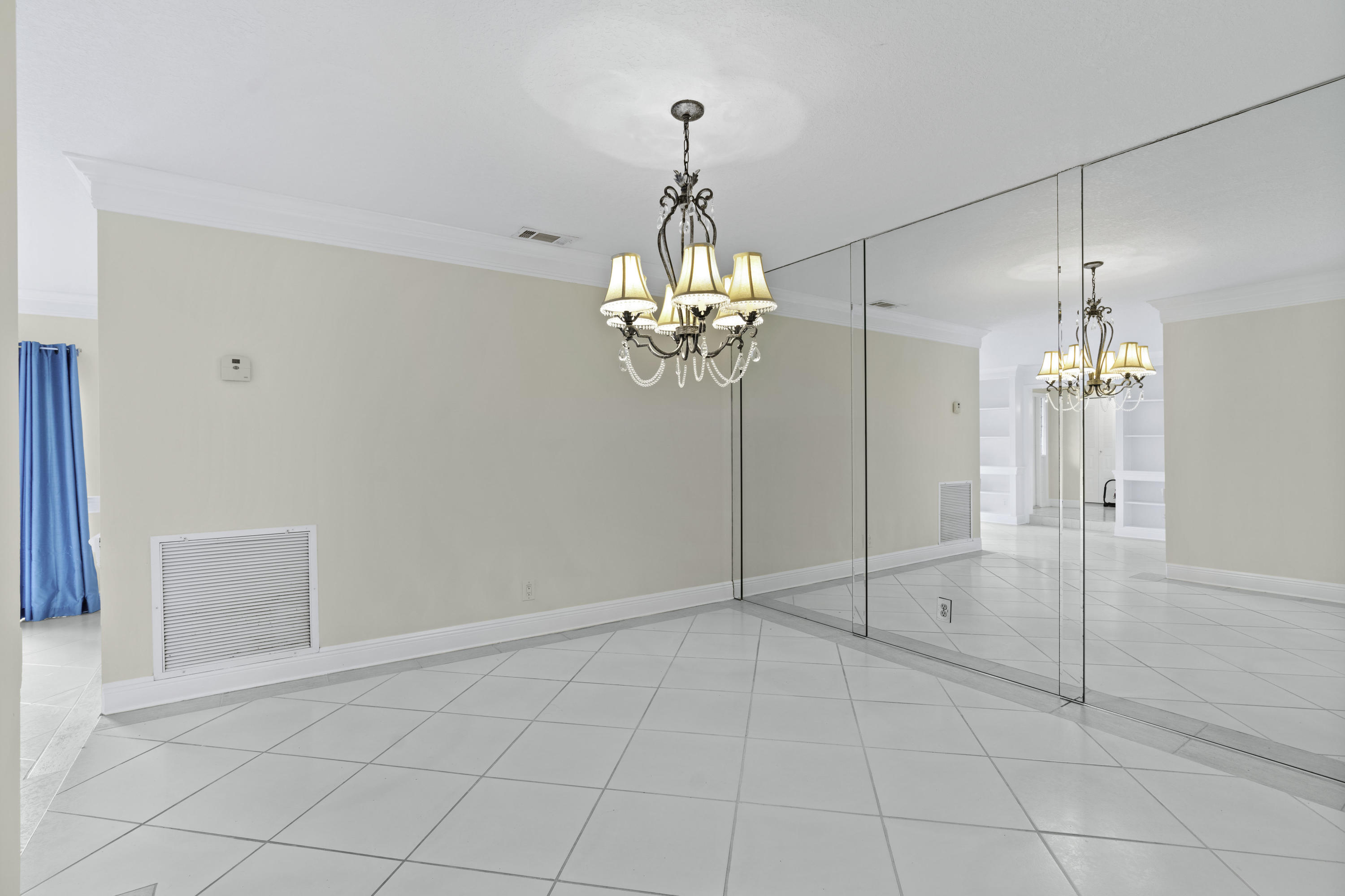 3375 Northwest 27th Avenue Boca Raton, FL 33434 - Photo 9 of 27 wooden floor in an empty room