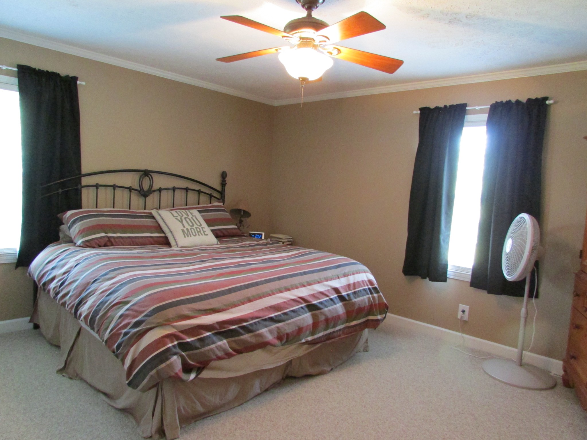 4765 Hickory Ridge Road Lebanon, TN 37087 - Photo 15 of 41 a bedroom with bed and a chandelier