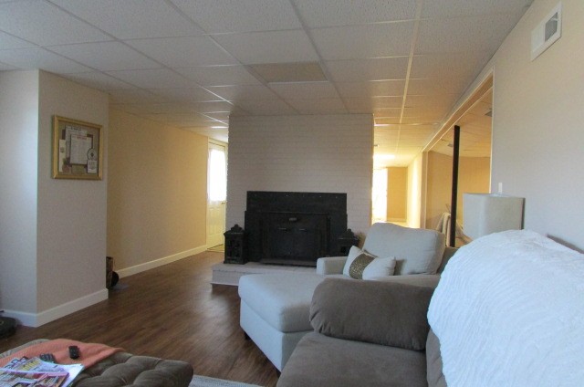 4765 Hickory Ridge Road Lebanon, TN 37087 - Photo 28 of 41 a living room with furniture and a wooden floor