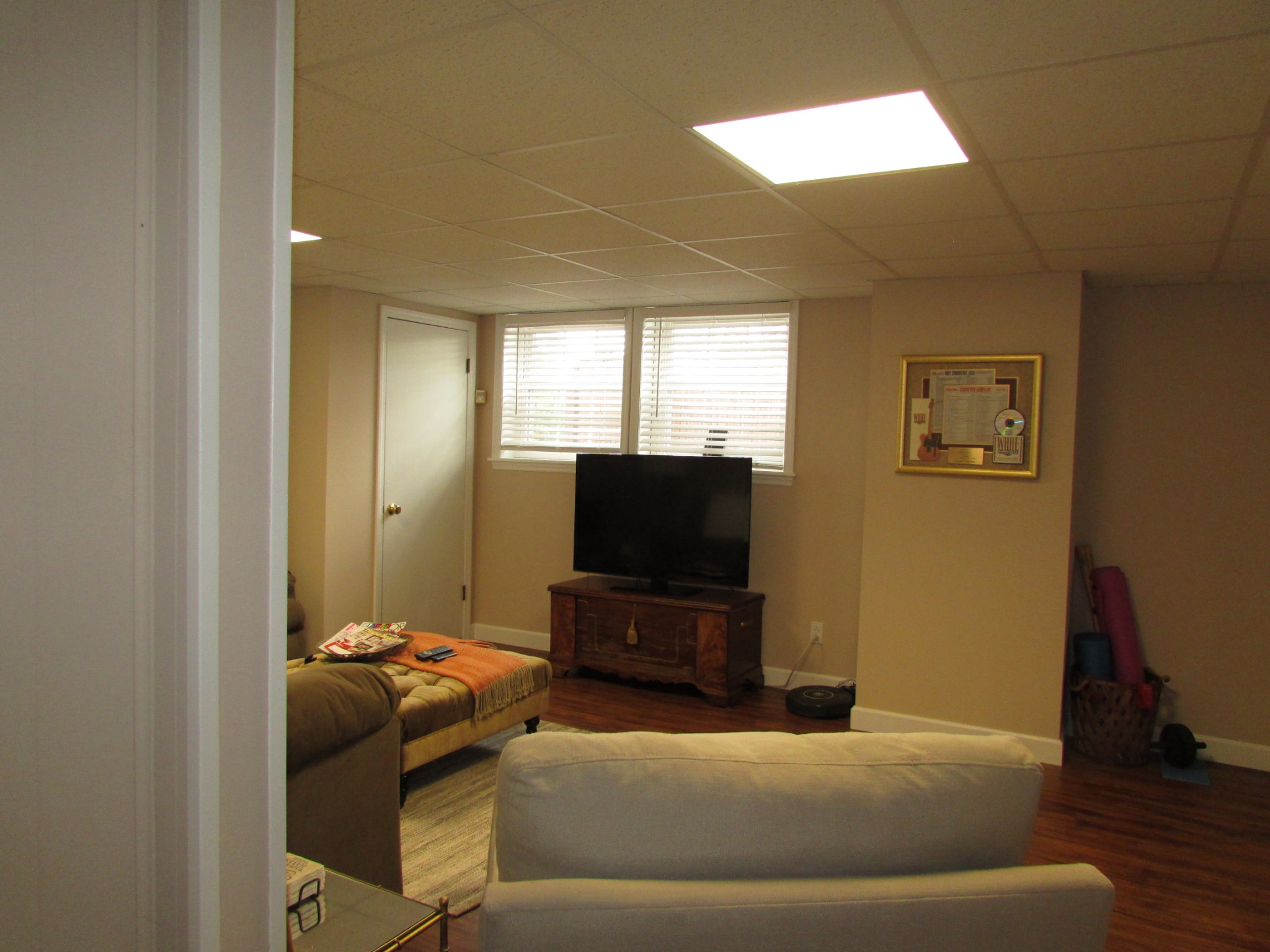 4765 Hickory Ridge Road Lebanon, TN 37087 - Photo 29 of 41 a living room with furniture and a flat screen tv