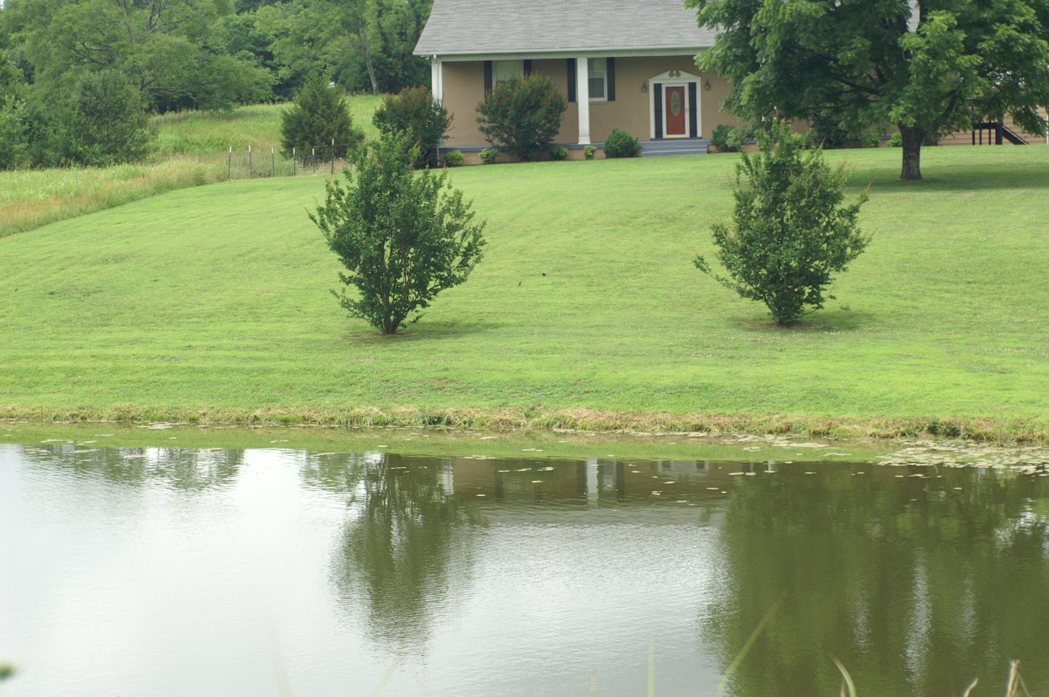 4765 Hickory Ridge Road Lebanon, TN 37087 - Photo 40 of 41 a view of a lake with a yard