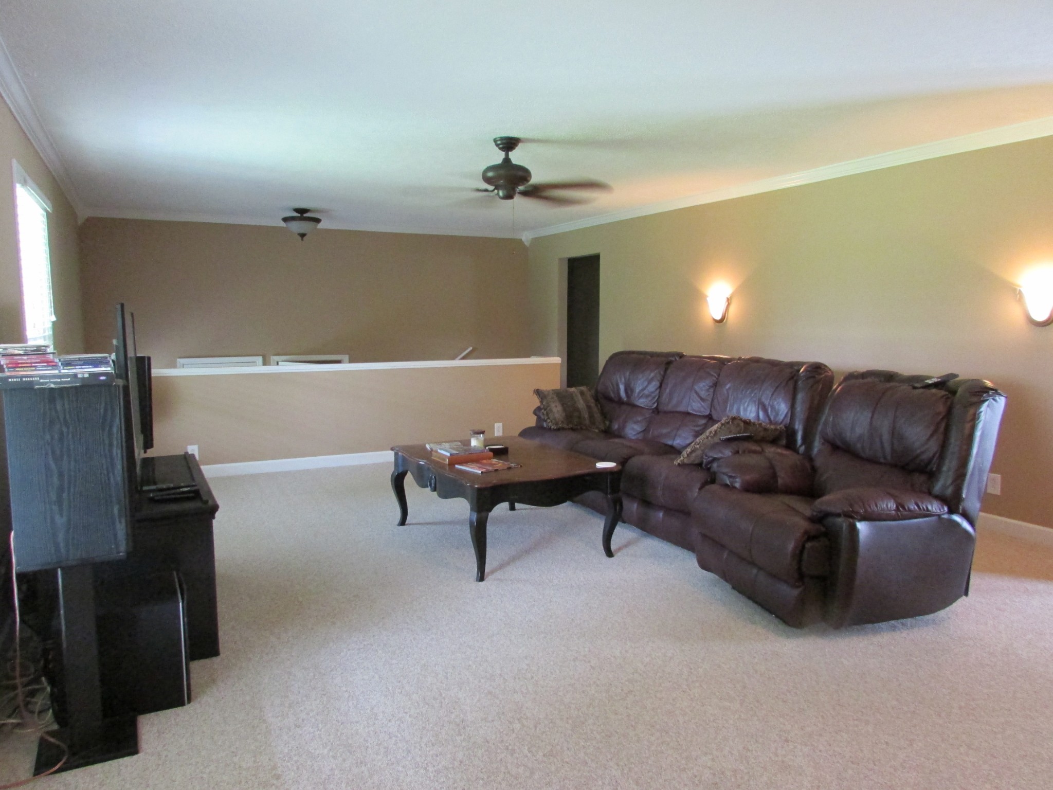 4765 Hickory Ridge Road Lebanon, TN 37087 - Photo 9 of 41 a living room with furniture and a ceiling fan