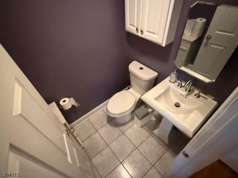 531 Harris Avenue Middlesex, NJ 08846 - Photo 13 of 19 a white toilet sitting next to a white sink