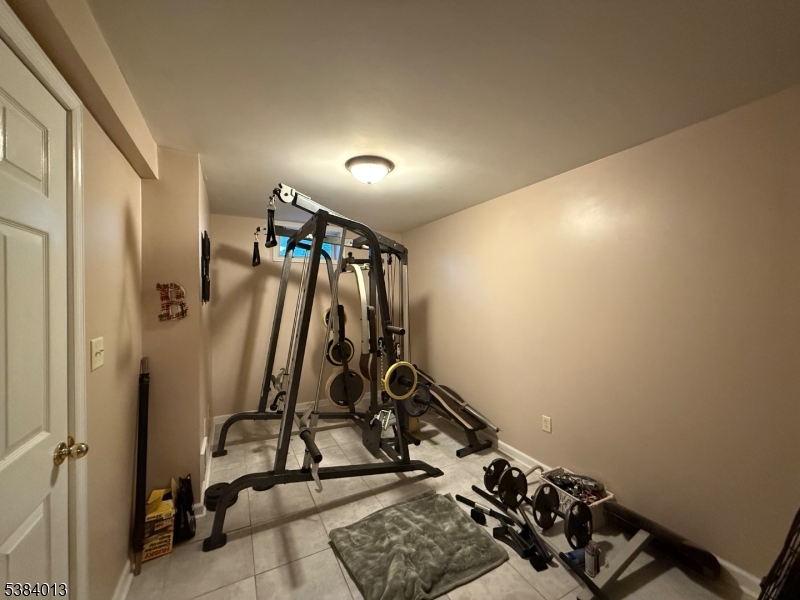 531 Harris Avenue Middlesex, NJ 08846 - Photo 14 of 19 a view of a room with gym equipment