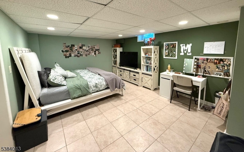 531 Harris Avenue Middlesex, NJ 08846 - Photo 16 of 19 a bedroom with furniture and a large window