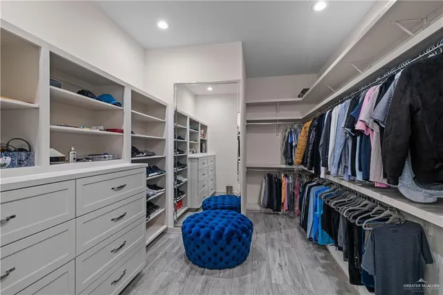 a bedroom with bed and a window