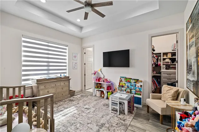 a bathroom with a sink vanity mirror and shower