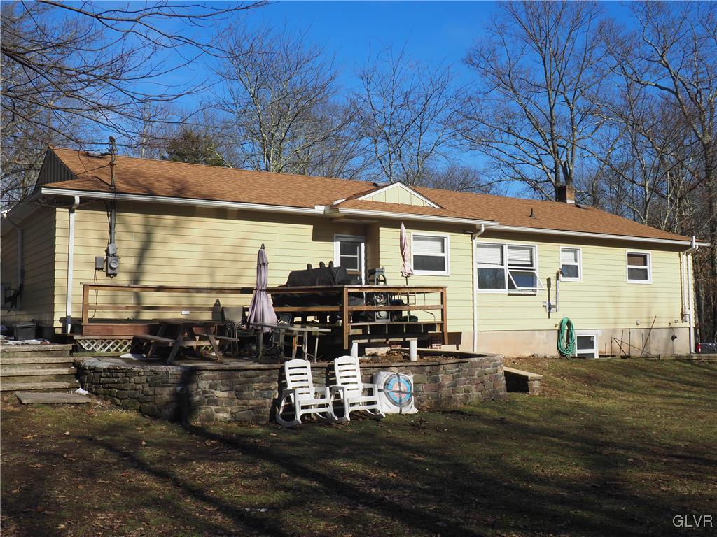 147 Williams Road Cresco, PA 18326 - Photo 2 of 35 a view of a house with backyard porch and sitting area