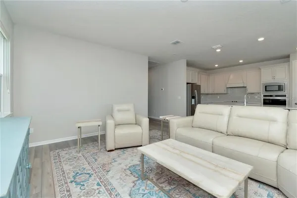 a living room with furniture and a couch