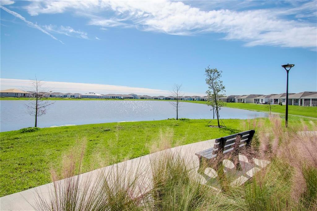 1991 Spring Shower Circle Kissimmee, FL 34744 - Photo 41 of 51 a view of a lake and a yard