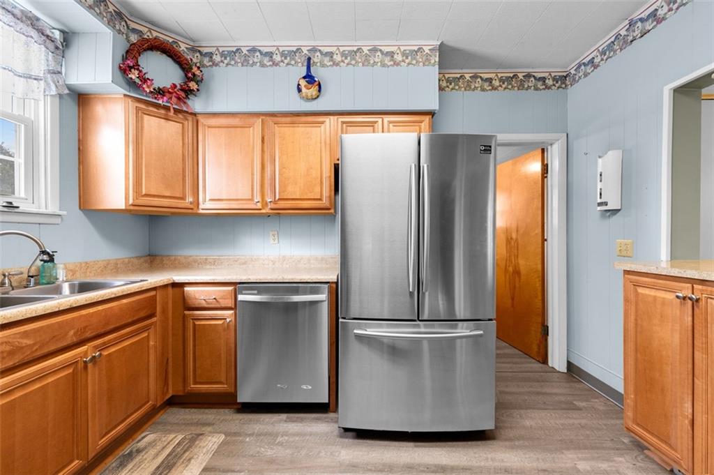 1738-1740 Hancock Avenue Apollo, PA 15613 - Photo 20 of 49 a kitchen with stainless steel appliances granite countertop a refrigerator and a sink
