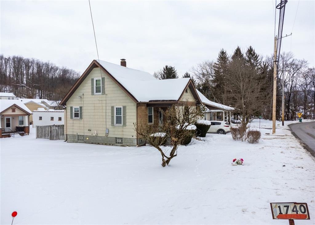 1738-1740 Hancock Avenue Apollo, PA 15613 - Photo 2 of 49 a view of a house with yard and sitting area