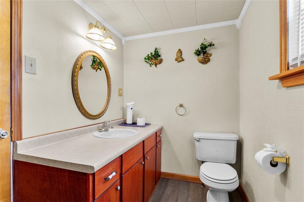 1738-1740 Hancock Avenue Apollo, PA 15613 - Photo 22 of 49 a bathroom with a sink mirror and toilet