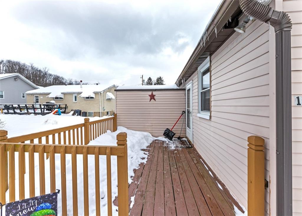 1738-1740 Hancock Avenue Apollo, PA 15613 - Photo 42 of 49 a view of a balcony with wooden floor and fence