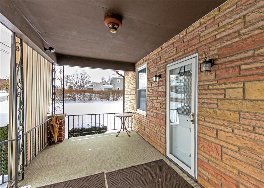 1738-1740 Hancock Avenue Apollo, PA 15613 - Photo 9 of 49 a view of a porch with wooden floor and outdoor space