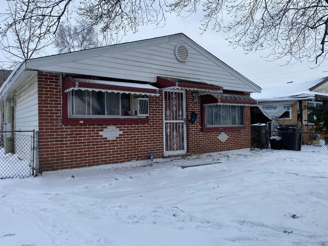 a front view of a house with a garage