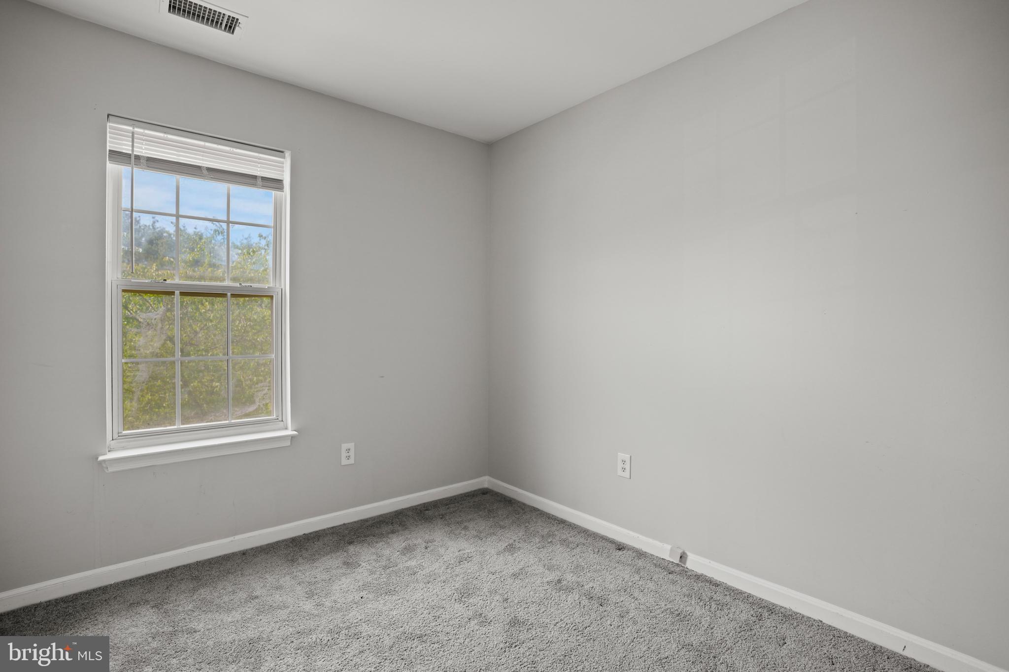 3915 Red Deer Circle Randallstown, MD 21133 - Photo 16 of 30 an empty room with a window