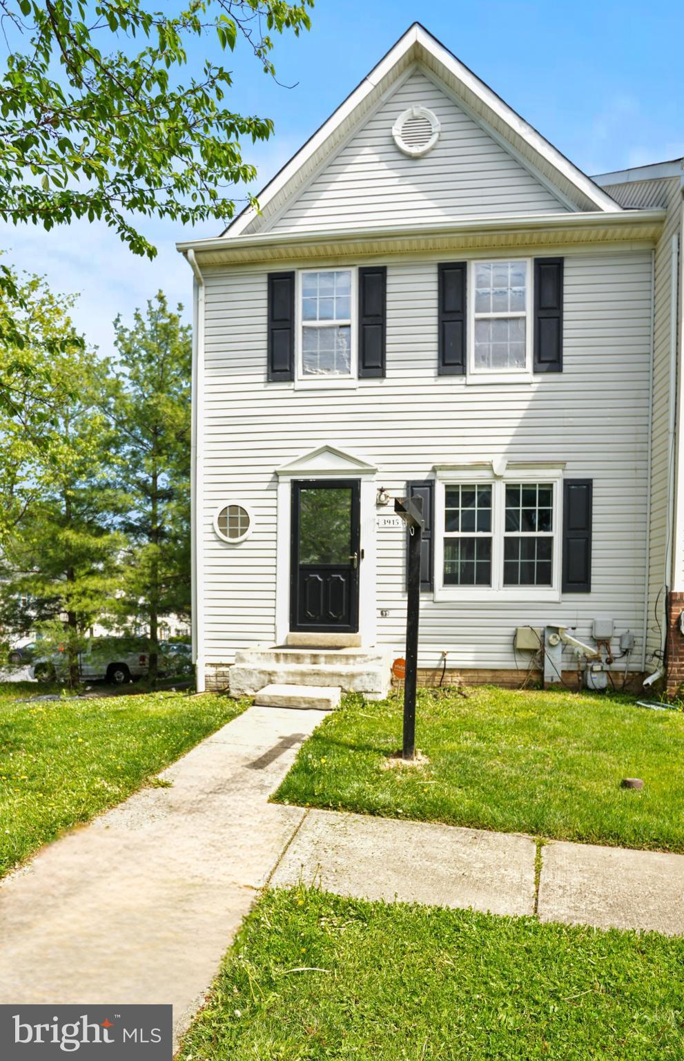 3915 Red Deer Circle Randallstown, MD 21133 - Photo 2 of 30 a front view of a house with a yard