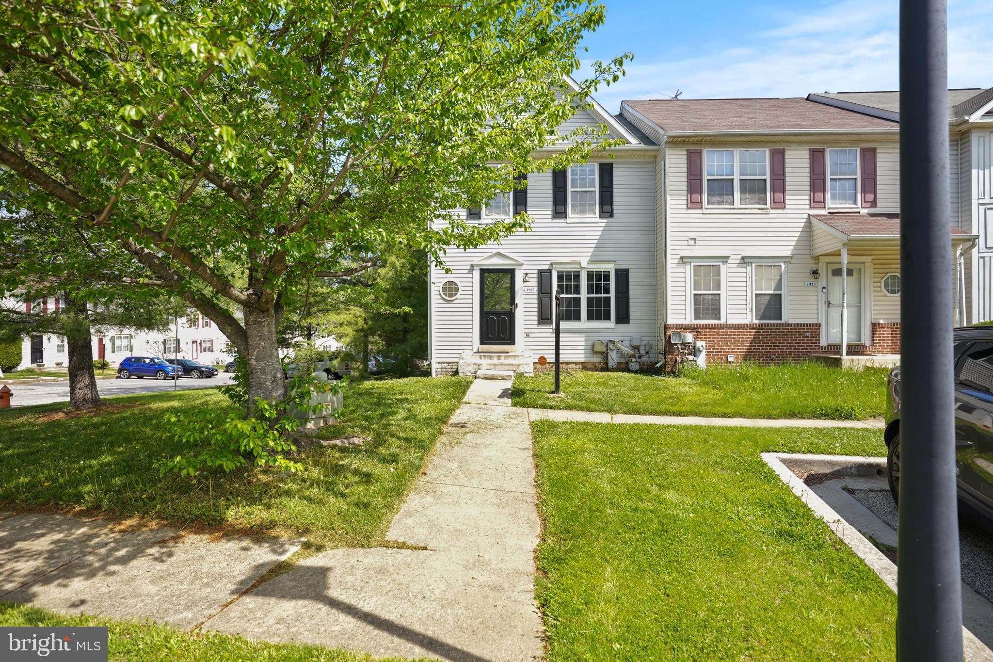 3915 Red Deer Circle Randallstown, MD 21133 - Photo 3 of 30 a view of house in front of a big yard with large trees