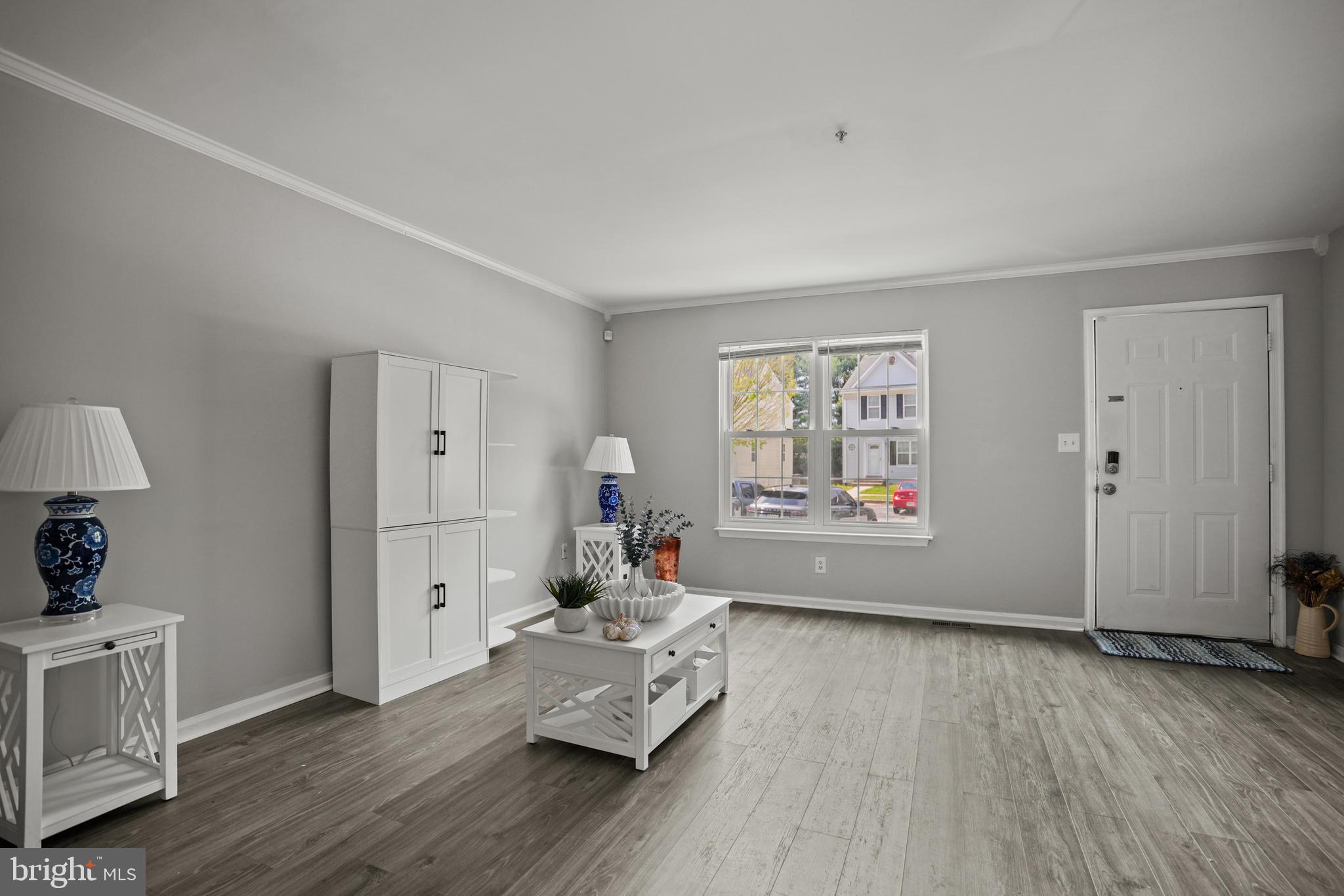 3915 Red Deer Circle Randallstown, MD 21133 - Photo 6 of 30 a living room with furniture and wooden floor