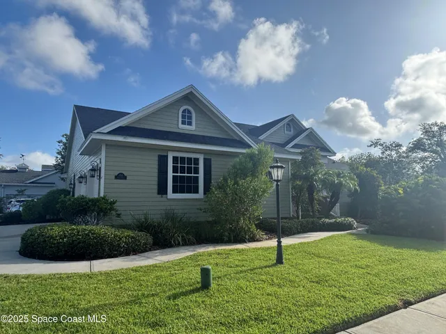 a house view with a garden space