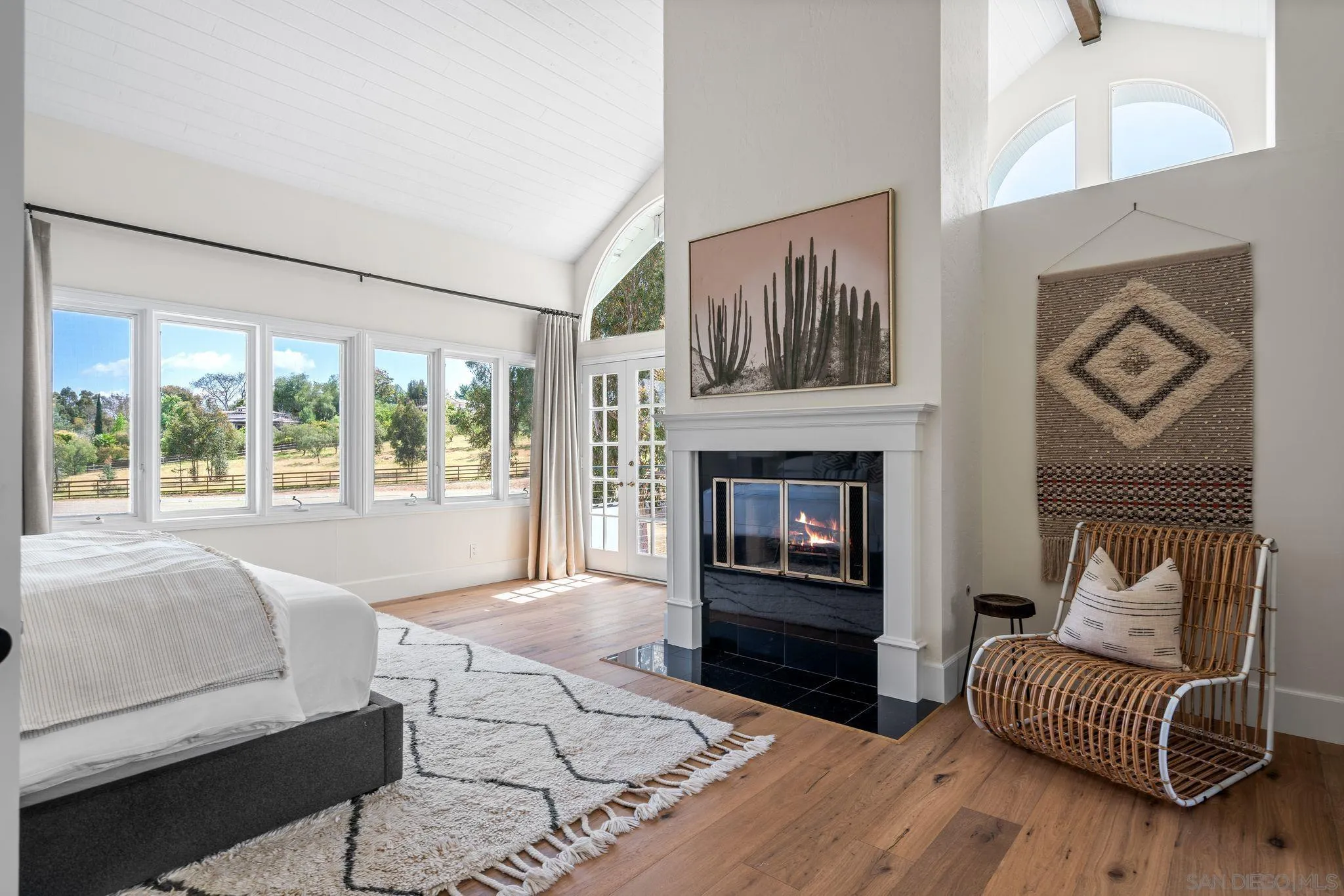 3355 Dove Hollow Road Encinitas, CA 92024 - Photo 15 of 37 a living room with furniture and a fireplace