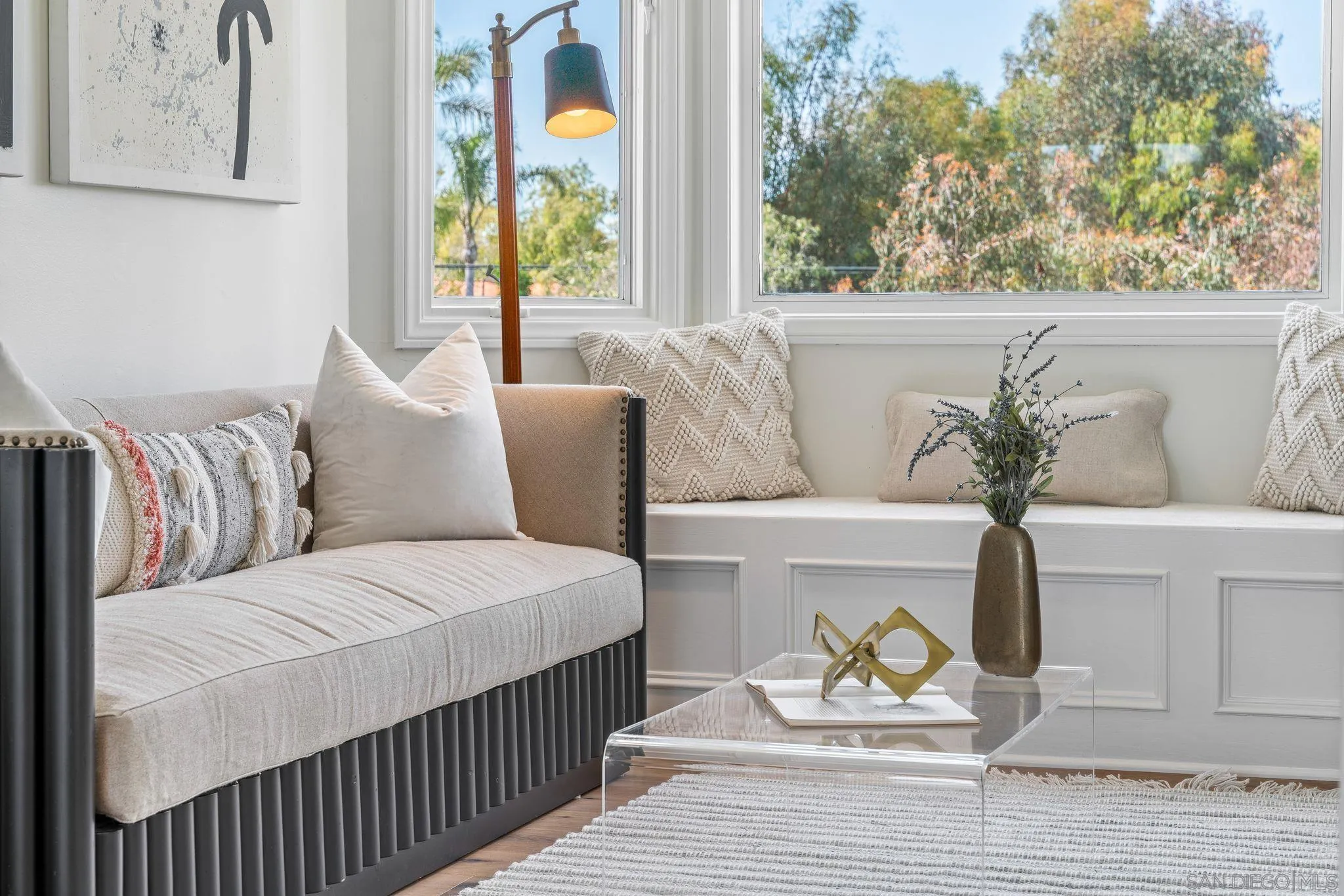 3355 Dove Hollow Road Encinitas, CA 92024 - Photo 17 of 37 a living room with a couch potted plant and a window