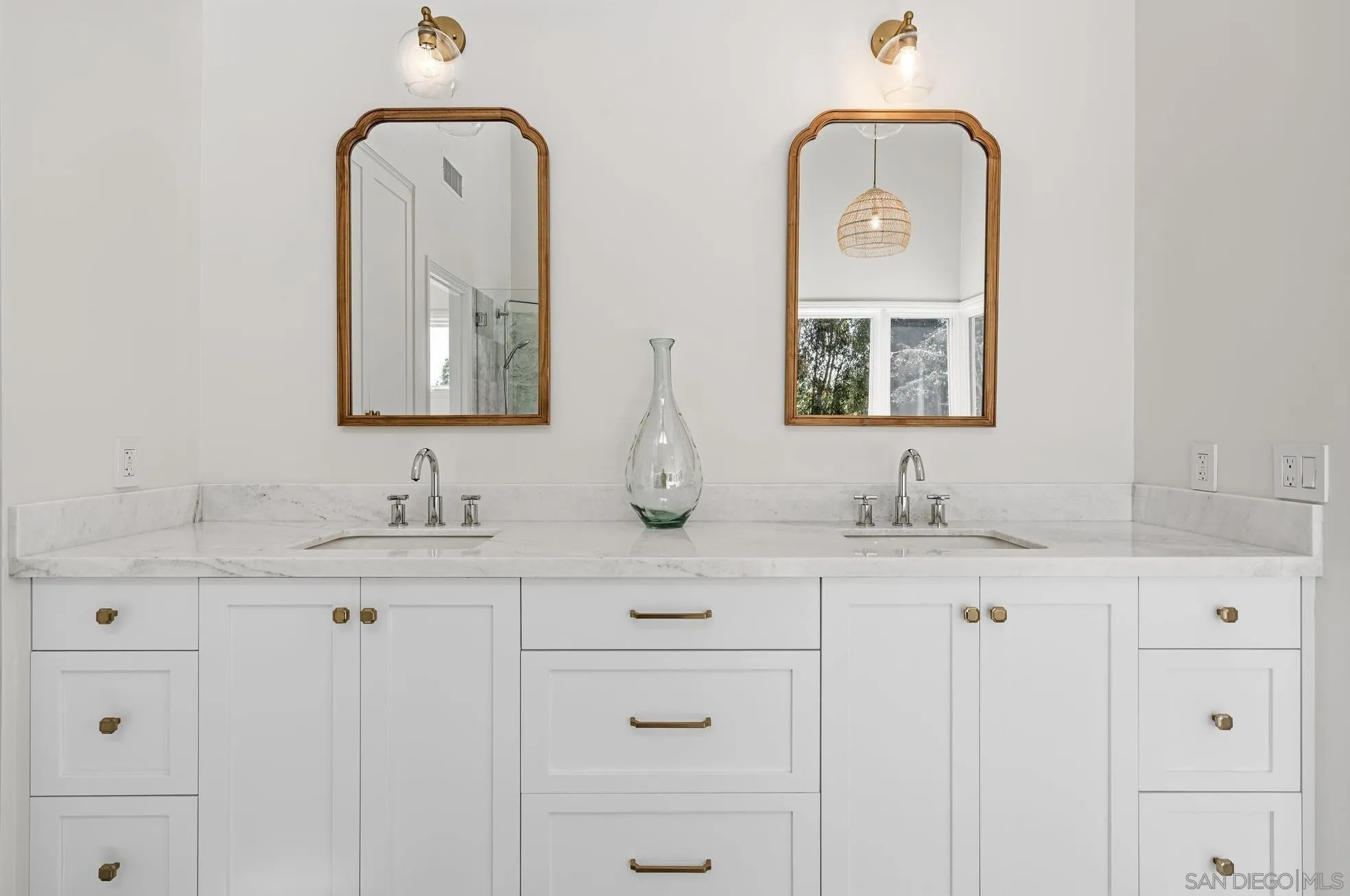 3355 Dove Hollow Road Encinitas, CA 92024 - Photo 19 of 37 a bathroom with sink two mirror and a