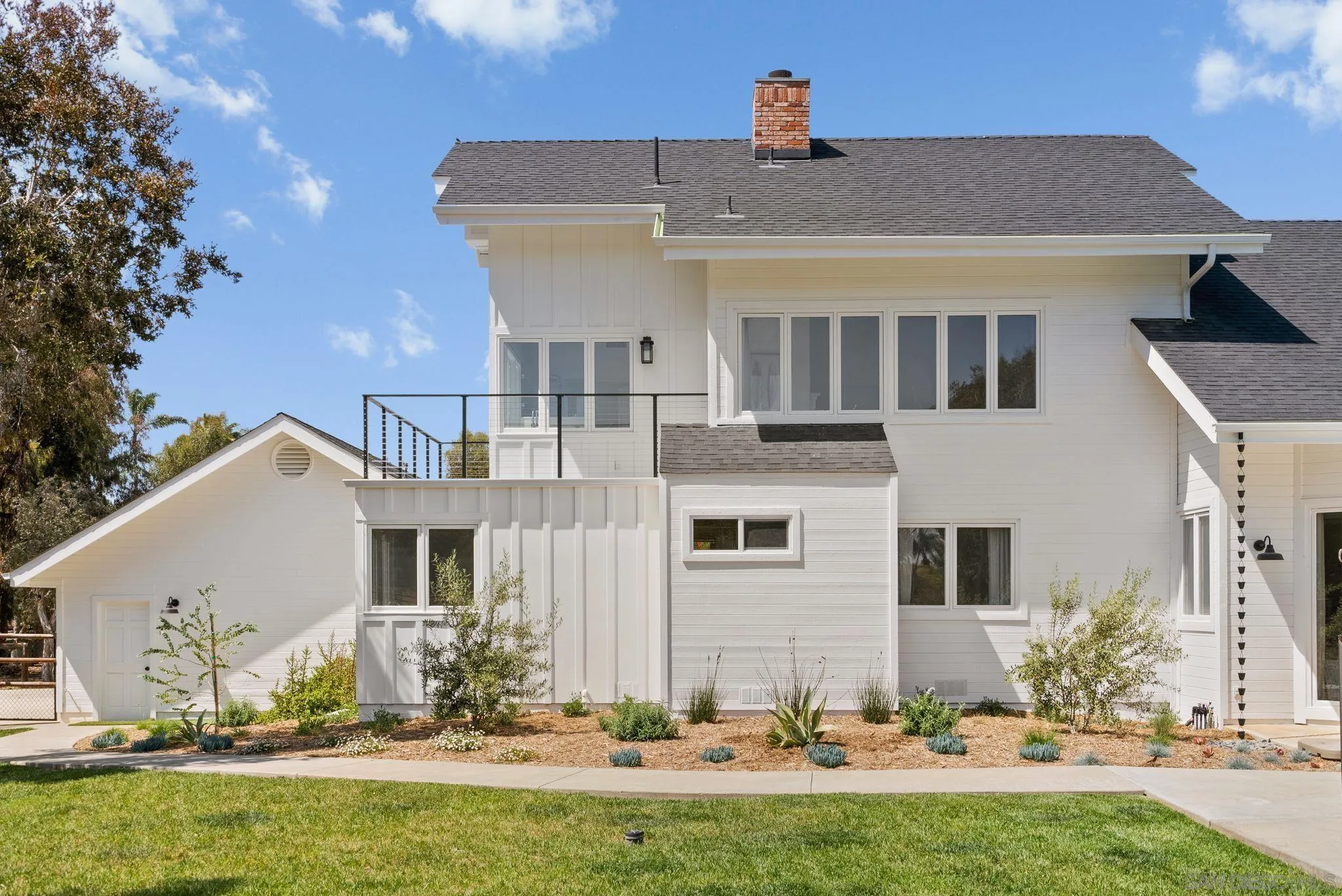 3355 Dove Hollow Road Encinitas, CA 92024 - Photo 2 of 37 a view of a house with a yard