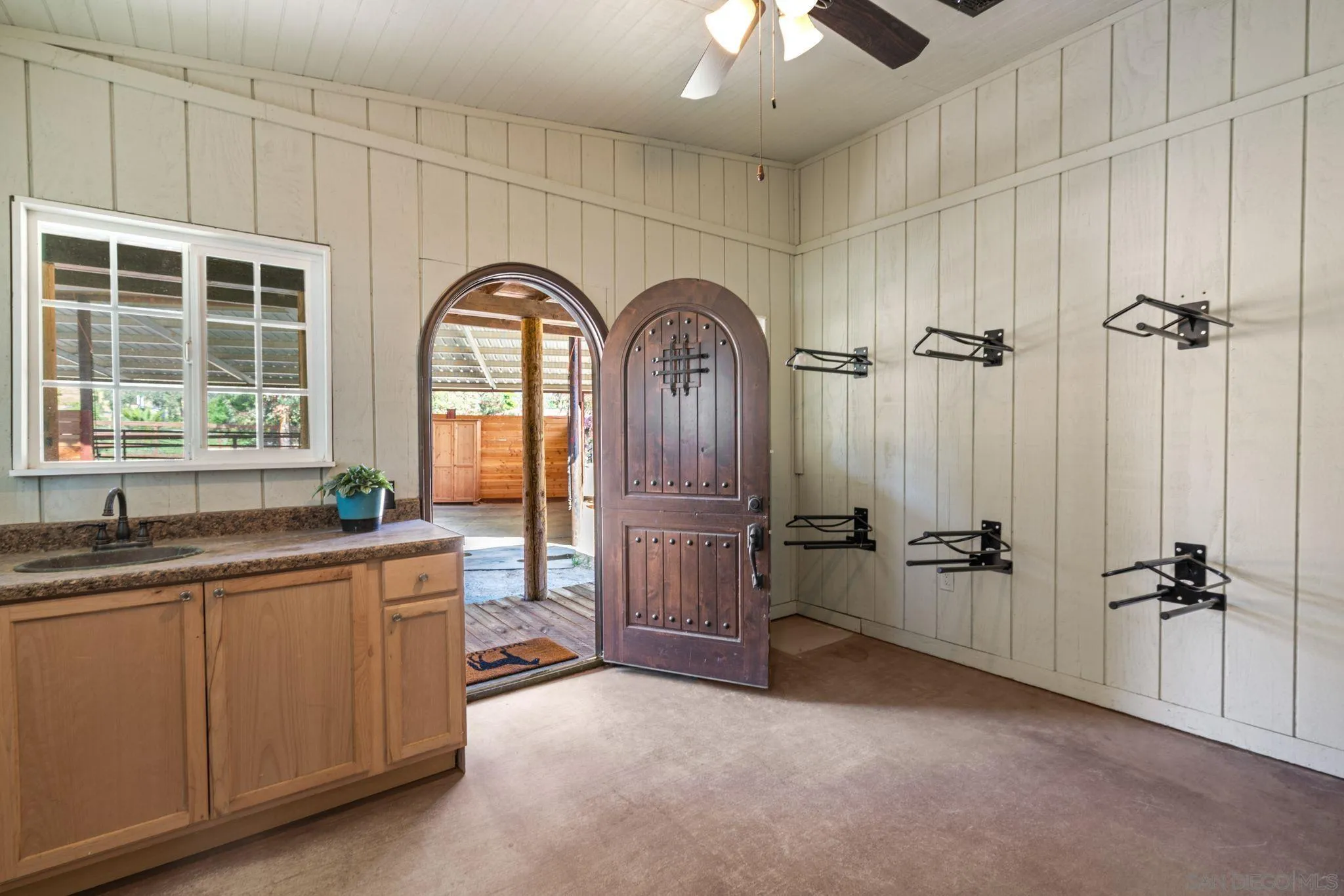 3355 Dove Hollow Road Encinitas, CA 92024 - Photo 27 of 37 a spacious bathroom with a granite countertop sink and mirror with bathtub